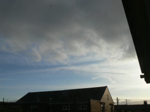 chemtrails UK geoengineering 1st April 2019 08:06 BST note the extent of the spreading haze, now we have the dark grey bank of aluminized cloud arriving from the west. note also many chemtrails out to sea, to the east.